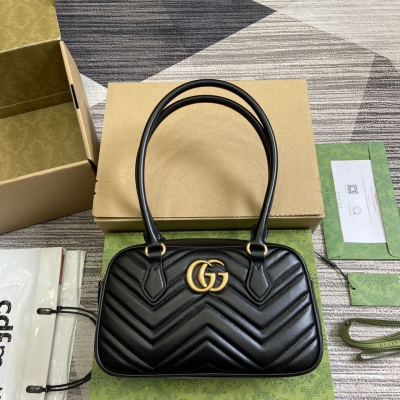 G*u*i top handle bags